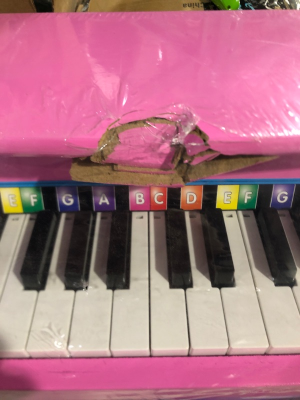 Photo 2 of Melissa & Doug Learn-to-Play Pink Piano With 25 Keys and Color-Coded Songbook