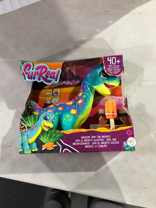 Photo 2 of FurReal Snackin' Sam The Bronto, Interactive Pets, 40+ Sounds and Reactions, Electronic Pets, Plush Dinosaur Toys for 4 Year Old Girls and Boys