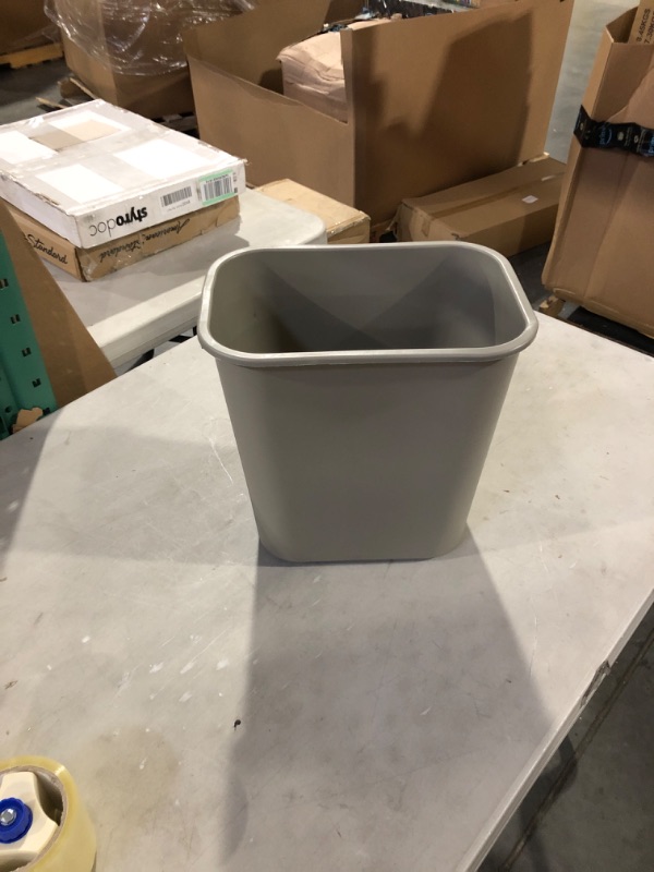 Photo 1 of 10x6x12 small brown trashcan