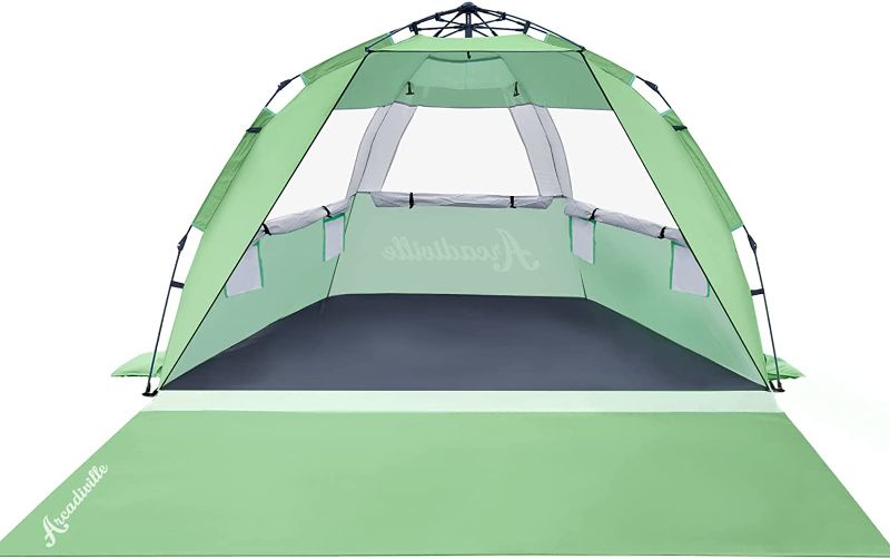 Photo 1 of ArcadiVille Pop up Beach Tent, Anti-UV Sun Shelter 4 Person Tent for Beach UPF 50+, Portable Lightweight Beach Shade Canopy Sun Tent w/ Extended Floor, Guylines & Stakes, 3 Ventilated Windows (Green)
