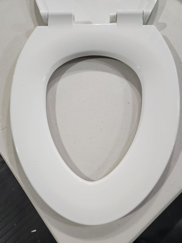 Photo 4 of DAMAGED- Delta Sanborne Elongated Nightlight Toilet Seat with Slow Close and Quick-Release, White With Nightlight Slow Close