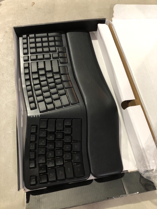 Photo 3 of Microsoft Ergonomic Keyboard - Black. Wired, Comfortable, Ergonomic Keyboard with Cushioned Wrist and Palm Support. Split Keyboard. Dedicated Office Key.
