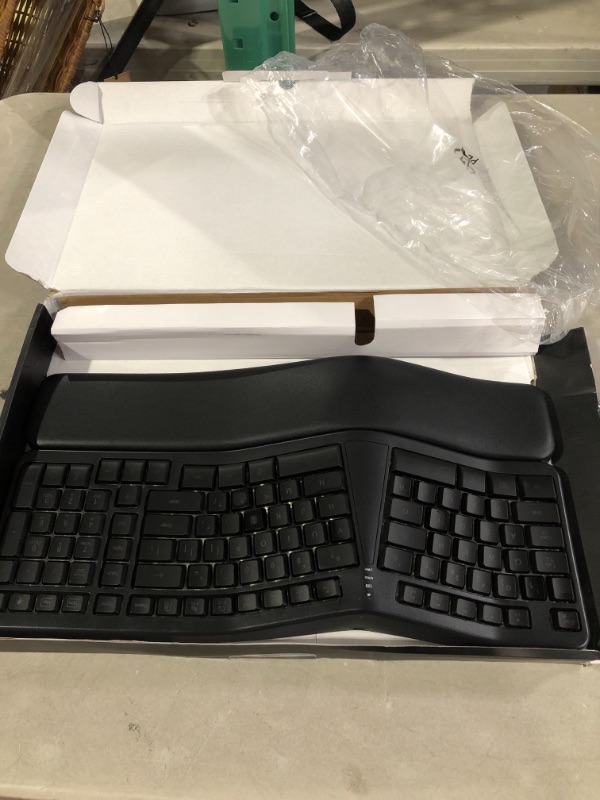 Photo 2 of Microsoft Ergonomic Keyboard - Black. Wired, Comfortable, Ergonomic Keyboard with Cushioned Wrist and Palm Support. Split Keyboard. Dedicated Office Key.
