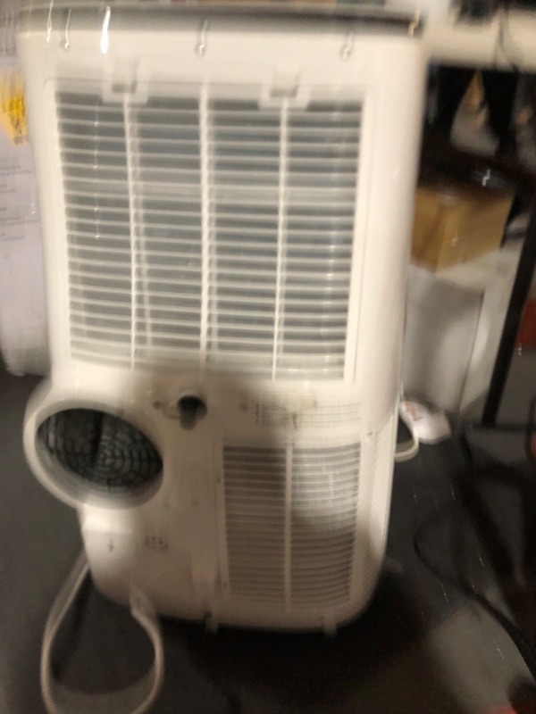 Photo 3 of **minor damage to power cable and back / side of unit** Honeywell 10,000 BTU Portable Air Conditioner with Dehumidifier & Fan Cools Rooms Up To 450 Sq. Ft. with Remote Control, HJ0CESWK7, White/Black Up to 450 Sq. Ft. Cooling Only