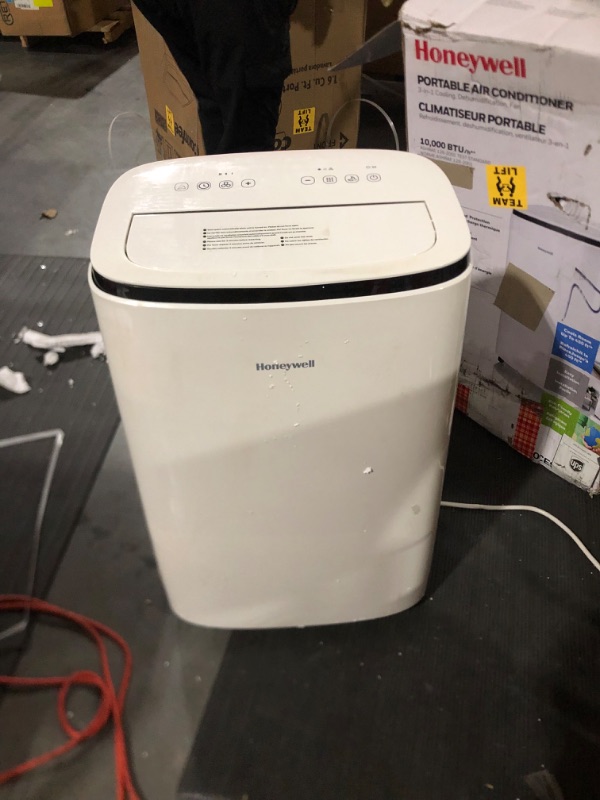Photo 4 of **minor damage to power cable and back / side of unit** Honeywell 10,000 BTU Portable Air Conditioner with Dehumidifier & Fan Cools Rooms Up To 450 Sq. Ft. with Remote Control, HJ0CESWK7, White/Black Up to 450 Sq. Ft. Cooling Only