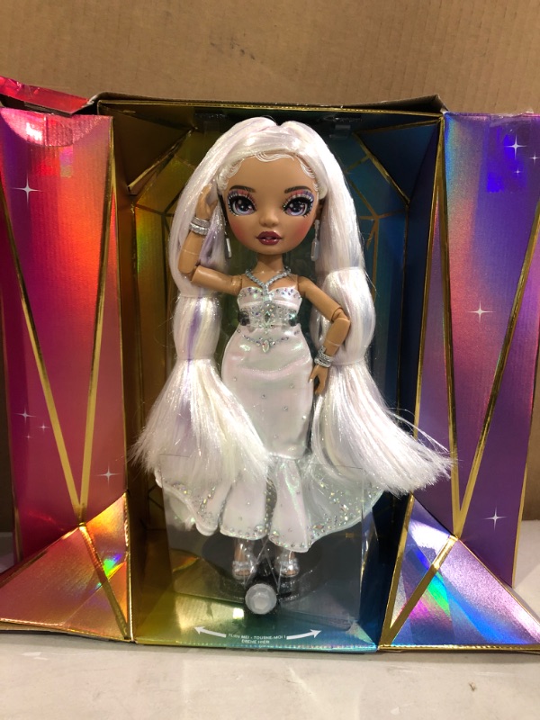 Photo 2 of Rainbow High Holiday Edition Collector Doll 11"- 2022 Roxie Grand Posable Fashion Doll with Multicolor Hair, in Diamond & Iridescent Designer Gown Including Premium Doll Accessories. Great Gift  * Open box, shipping damage to carton, no visible damage or 