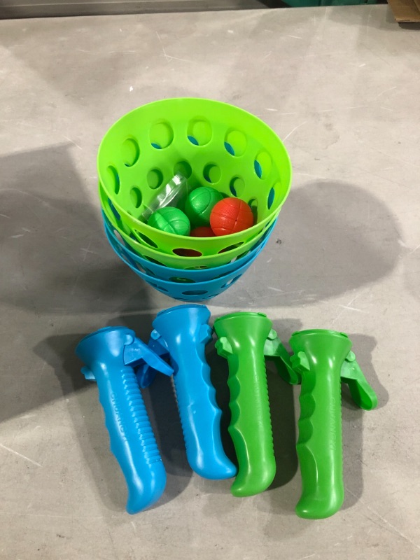 Photo 2 of Outdoor Indoor Game Activities for Kids, Pop-Pass-Catch Ball Game with 4 Catch Launcher Baskets and 6 Balls, Halloween Christmas Party Favors Gift Beach Sport Toys for Kids Age 5 6 7 8 9 10+ and Adult