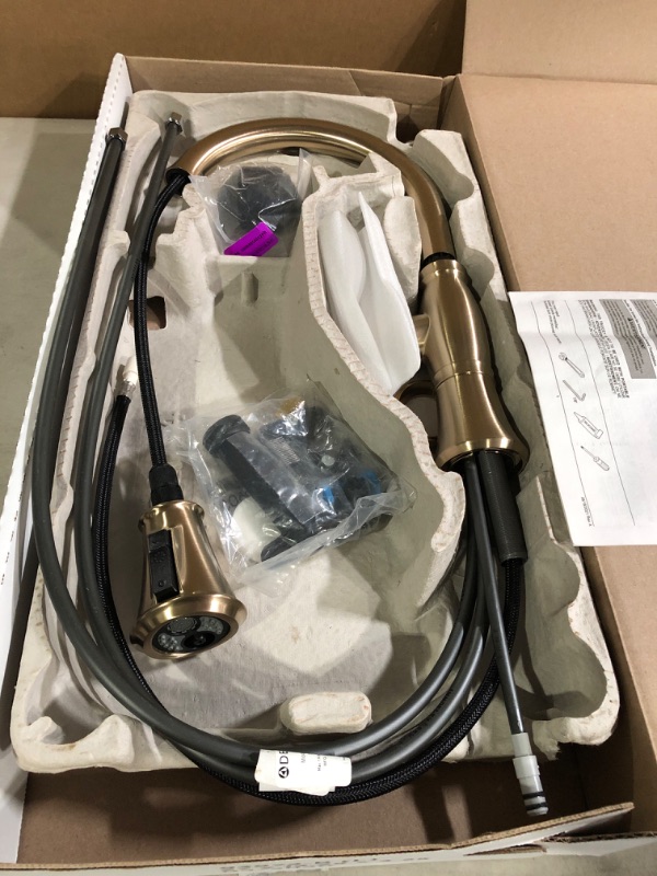 Photo 2 of Delta Faucet Cassidy Gold Kitchen Faucet, Kitchen Faucets with Pull Down Sprayer, Kitchen Sink Faucet, Gold Faucet for Kitchen Sink with Magnetic Docking, Lumicoat Champagne Bronze 9197-CZ-PR-DST Lumicoat Champagne Bronze Standard. * Open box, looks clean