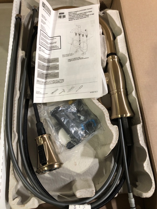 Photo 3 of Delta Faucet Cassidy Gold Kitchen Faucet, Kitchen Faucets with Pull Down Sprayer, Kitchen Sink Faucet, Gold Faucet for Kitchen Sink with Magnetic Docking, Lumicoat Champagne Bronze 9197-CZ-PR-DST Lumicoat Champagne Bronze Standard. * Open box, looks clean