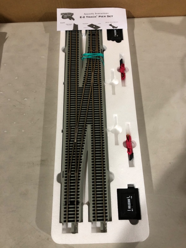 Photo 3 of Bachmann Trains - Snap-Fit E-Z TRACK #6 REMOTE CROSSOVER TURNOUT - LEFT (1/box) - NICKEL SILVER Rail With Gray Roadbed - HO Scale.
* Open box, possible missing parts, see pic. No other visible damage. Unable to test. *