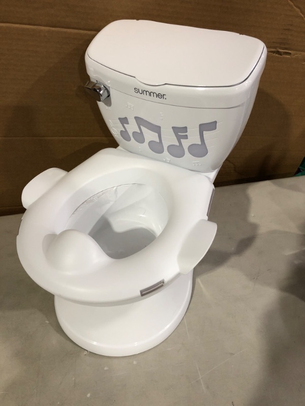 Photo 2 of Summer My Size Potty Lights and Songs Transitions, White – Realistic Potty Training Toilet with Interactive Handle that Plays Music for Kids, Removable Potty Topper/Pot, Wipe Compartment, Splash Guard White w/ Lights & Songs.  * Open item, no visible dama