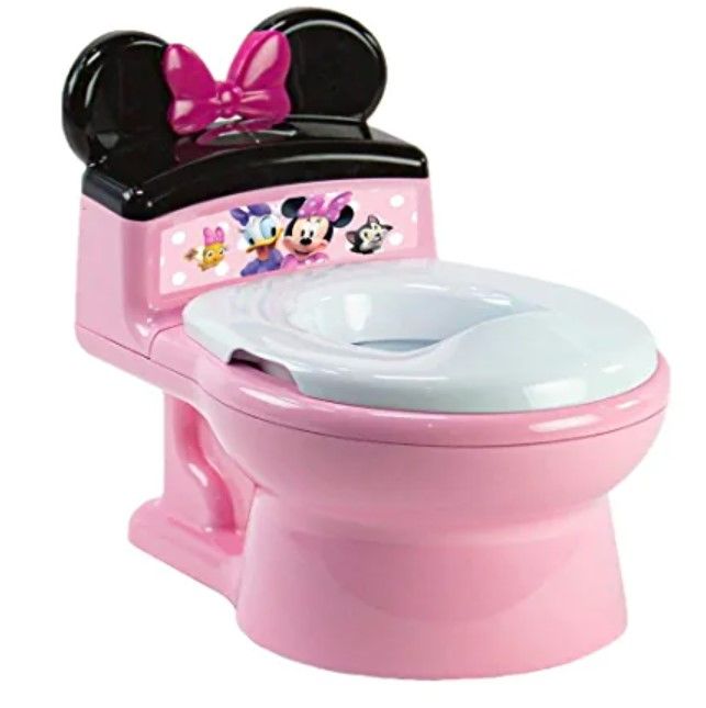 Photo 1 of The First Years Disney Minnie Mouse Potty and Trainer Seat.
* Damaged, rear of product out of shape. * (See pic)