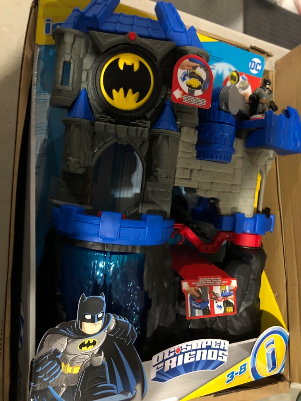 Photo 2 of Imaginext DC Super Friends Batman Toy, Wayne Manor Batcave Playset with Batman Figure Batcyle and Accessories