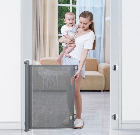 Photo 1 of BabyBond Retractable Baby Gates, Punch-Free Install Baby Gate Extra Wide 71” X 33” Tall, Grey