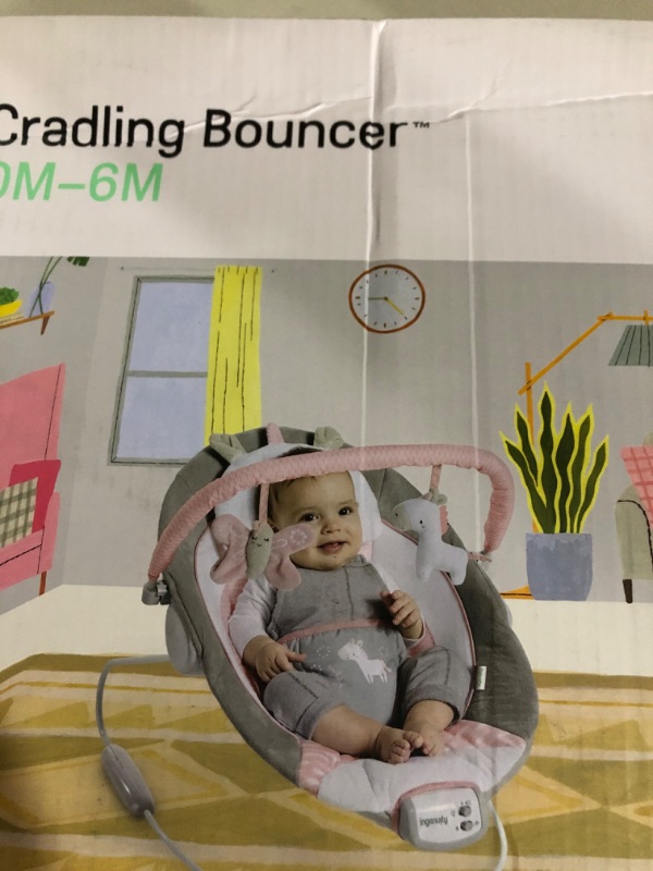 Photo 1 of Ingenuity Soothing Baby Bouncer with Vibrating Infant Seat, Music, Removable -Toy Bar & 2 Plush Toys - Flora the Unicorn (Pink), 0-6 Months