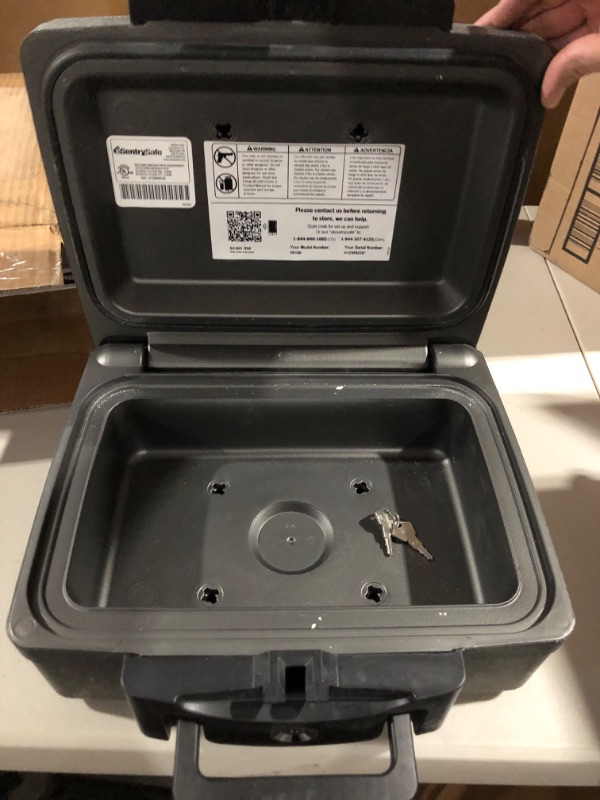 Photo 2 of **USED** SentrySafe Fireproof and Waterproof Safe Box with Key Lock, Chest Safe for Home with Water-Resistant and Fire-Resistant Security, 0.17 Cubic Feet, 6.1 x 14.3 x 13 Inches, H0100