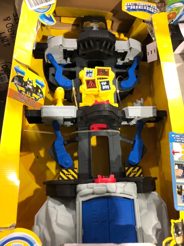 Photo 2 of Fisher-Price Imaginext DC Super Friends, Transforming Batcave, Batman playset with character figures for preschool kids 3 years and up