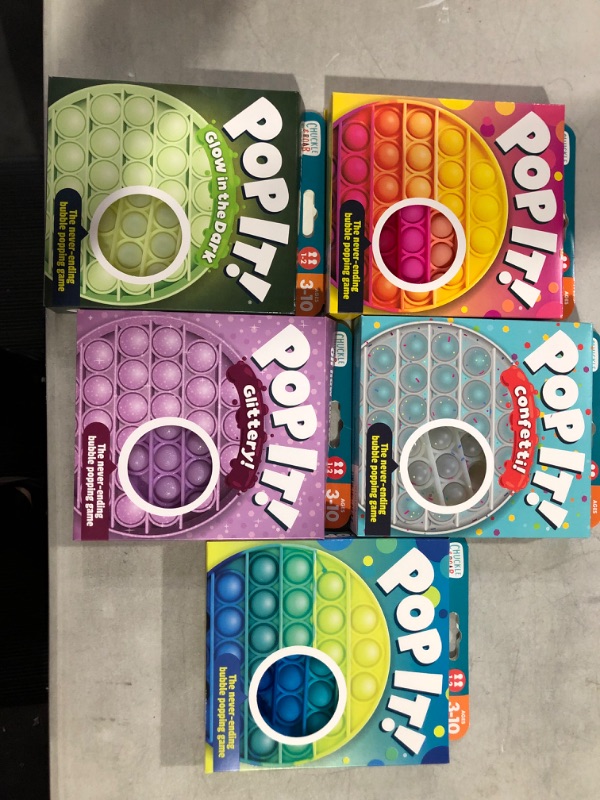 Photo 1 of Chuckle & Roar Pop It! PURPLE GLITTERY,CONFETTI,GLOW IN THE DARK,COLURFUL GREENISH BLUISH AND COLURFUL PINK ORANGE YELLOISH Bubble Popping Sensory Game Fidget Toy