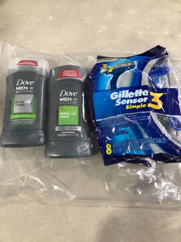 Photo 1 of Assorted Mens Skin Care Products. 
2 Dove Men Care Extra Fresh Deodorant and Gilette Sensor razor 