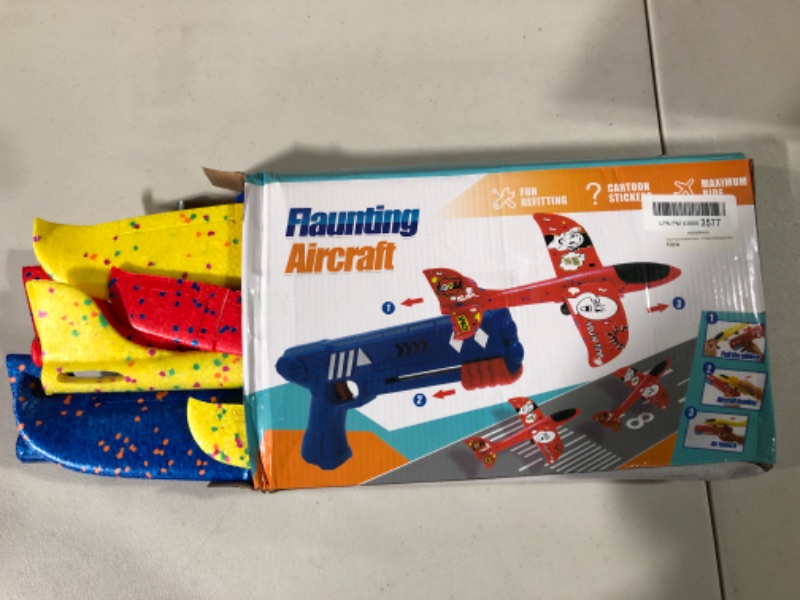 Photo 2 of Kids Toys Airplane Toys with Launcher - 3 Pack Foam Plane Toys Include 3 Sets of Dinosaur Themed DIY Stickers - Fun Outdoor Toys Shooting Game - Birthday Gift Toys for 3 4 5 6 7 8 Years Old Boys Girls