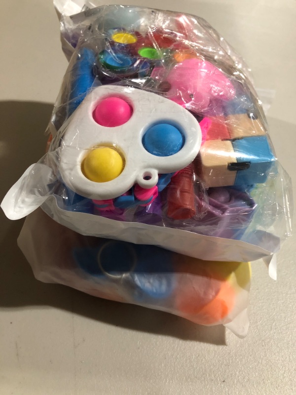 Photo 1 of IALATA Unicorn Fidget Toys Pack Set Pop Purse Crossbody Bag Fidgets Toy Sets Packs Fidget Toys Pack Gifts Stress Relief and Anti-Anxiety Tools for Girls Boys Autistic Children Kids (14 Packs) 
WITH
 4Pack Halloween Pop Fidget Toy Set for Kids and Adults, 