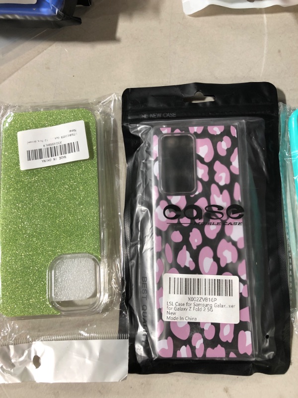 Photo 2 of assorted screen protector and cell phone case bundle 