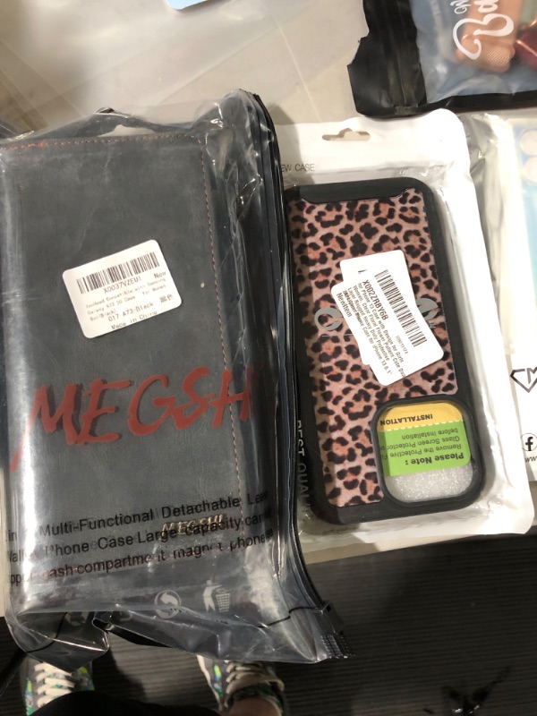 Photo 2 of assorted cell phone cases and wallets