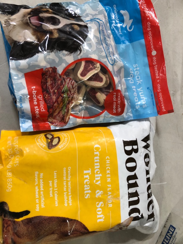 Photo 1 of cat food and dog food bundle 