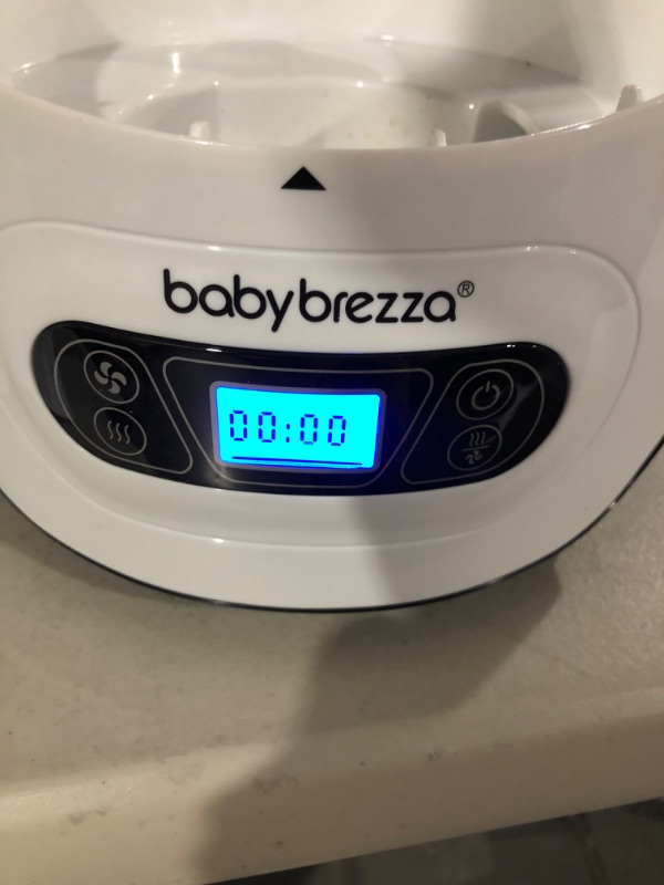 Photo 2 of Baby Brezza Baby Bottle Sterilizer and Dryer Machine – Electric Steam Sterilization - Universal Fit - Pacifiers, Glass, Plastic, and Newborn Feeding Bottles