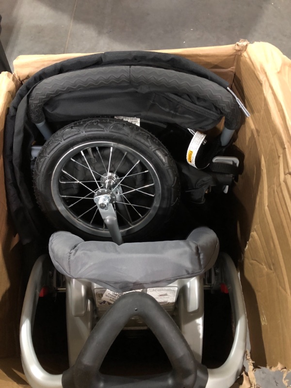 Photo 1 of Baby Trend Expedition Jogger Travel System, Millennium White + Baby Trend EZ Flec Loc 32 Infant Car Seat Base, Black