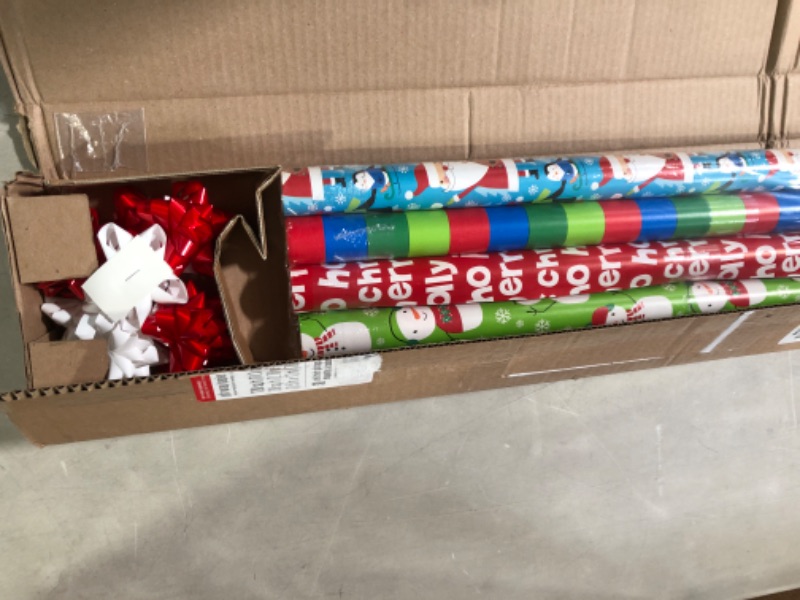 Photo 2 of American Greetings Christmas Wrapping Paper Kit with Gift Tags, Variety Set (4 Rolls, 7 Bows, 30 Gift Tags) Santa, Snowmen, and Stripes