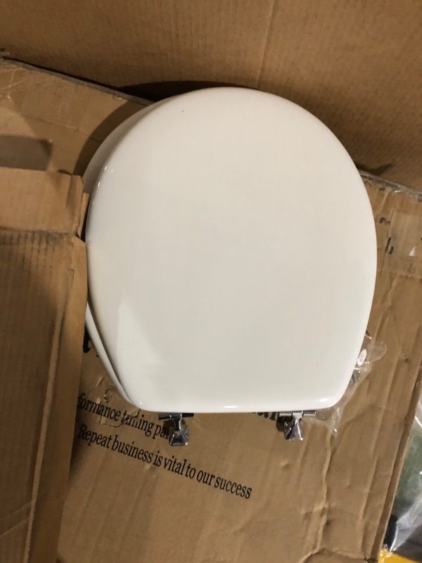 Photo 2 of Bemis 1500EC 390 Toilet Seat with Easy Clean & Change Hinges, Elongated, Durable Enameled Wood, Cotton White Cotton White 1 Pack Elongated Toilet Seat