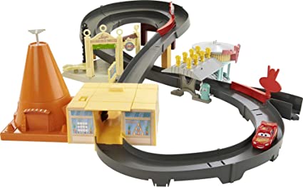 Photo 1 of * USED * Disney and Pixar Cars Toys, Track Set with Lightning McQueen Toy Car, Race Around Radiator Springs with Speed Booster????