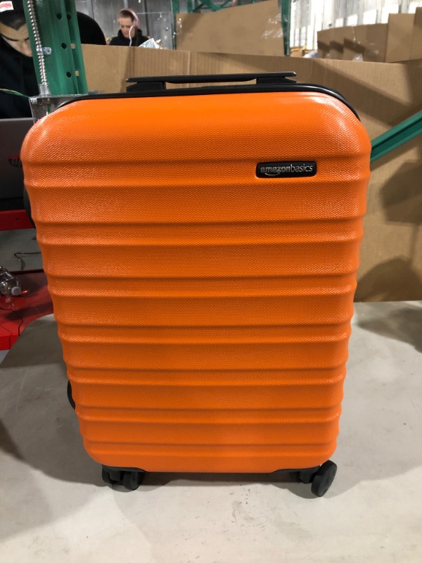Photo 1 of Amazon Basics 26-Inch Hardside Spinner, Orange