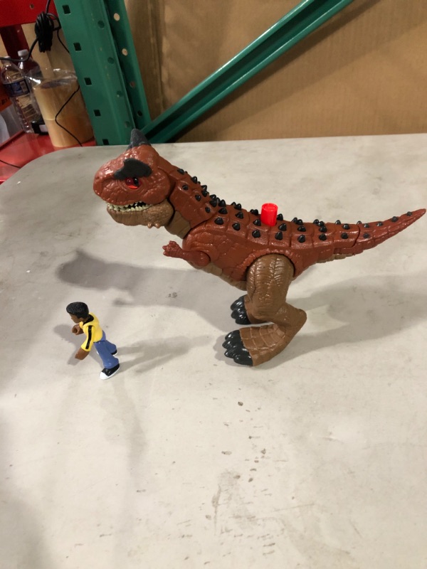 Photo 2 of Fisher-Price Imaginext Jurassic World Camp Cretaceous Carnotaurus Dinosaur & Darius Figure Set.