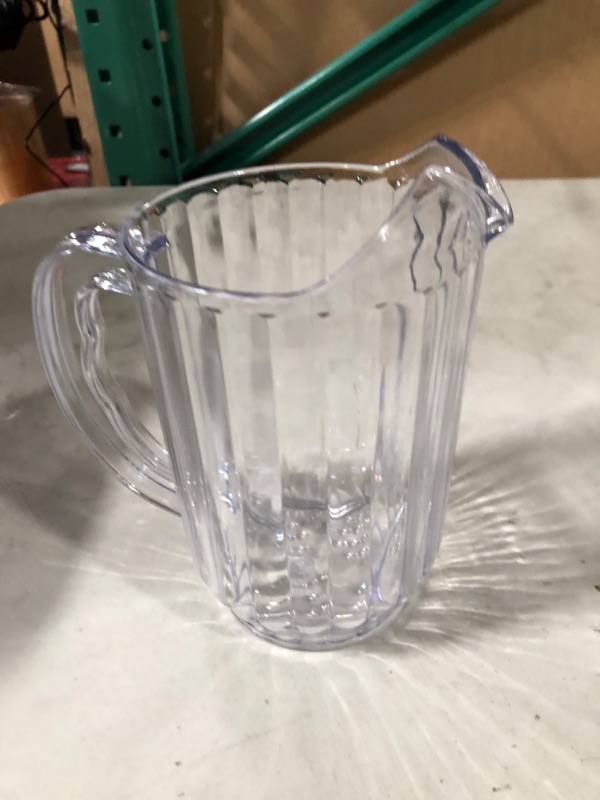 Photo 2 of  Clear Plastic Water Pitcher.