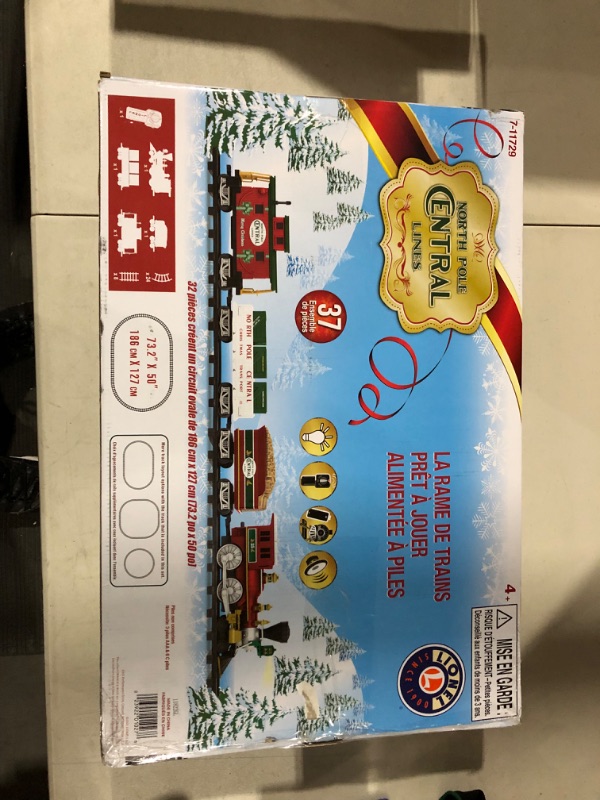 Photo 2 of Lionel North Pole Central Battery-Powered Train Set with Remote + Inner Loop Track Expansion Pack Complete Set + Expansion Track (Inner Loop)