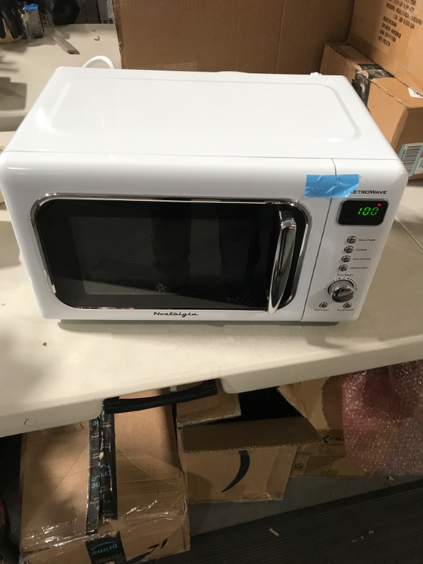 Photo 2 of Nostalgia Retro Compact Countertop Microwave Oven 0.7 Cu. Ft. 700-Watts with LED Digital Display, Child Lock, Easy Clean Interior, White