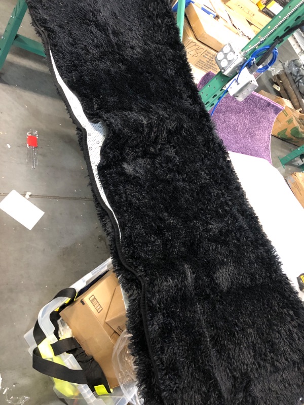 Photo 2 of black sherpa rug -112 inches by 70 inches 