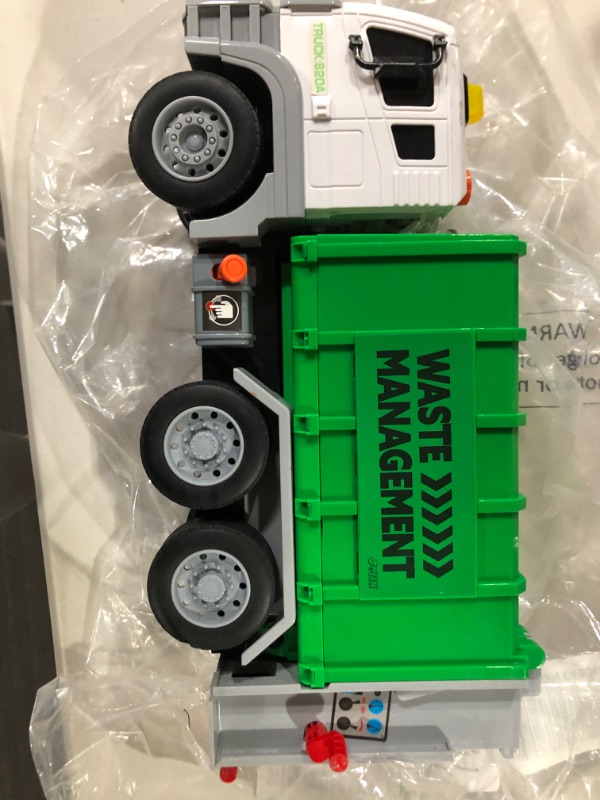 Photo 2 of MIGHTY FLEET Motorized Garbage Truck Toy