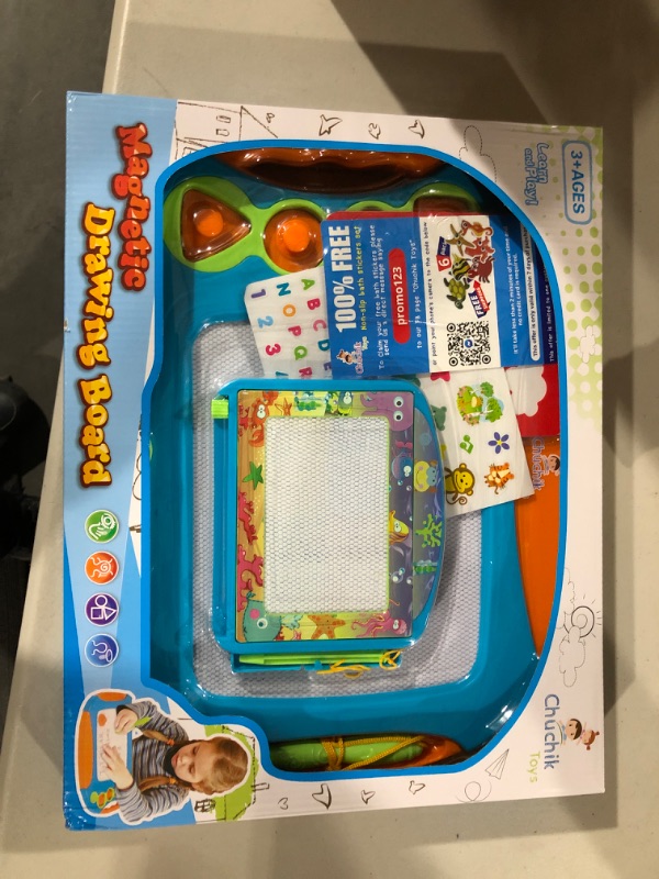 Photo 2 of Chuchik Magnetic Drawing Board Set for Kids and Toddlers. Large 15.7 Inch Doodle Board Writing Pad Comes with a 4-Color Travel Size Drawing Board for Toddlers 1-3 (Orange-Blue)