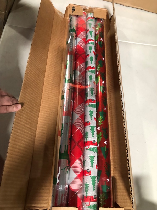 Photo 2 of American Greetings Christmas Reversible Wrapping Paper Bundle, Stripes, Polka Dots, Plaid, Reindeer, Trucks and Trees (4 Rolls, 120 sq. ft) Stripes, Polka Dots, Plaid, Reindeer, Christmas Trucks and Trees Wrapping Paper