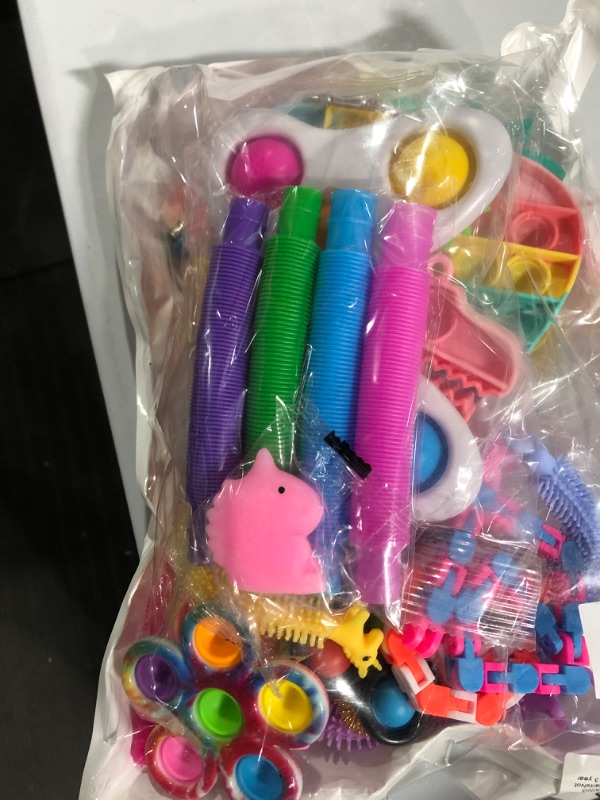 Photo 1 of small bag of baby toys 