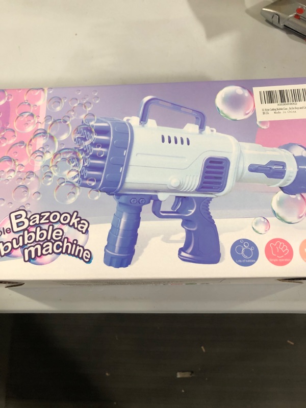 Photo 2 of Bubble Machine for Toddlers, 32-Hole Bubble Blower Rocket Launcher for Kids Bubble Maker 