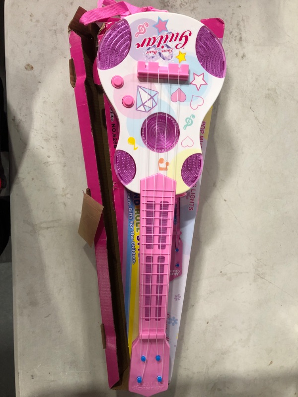 Photo 2 of M SANMERSEN Kids Toy Guitar Pink Guitar for Kids 4 Strings Children Electric Guitar with Flash Light Educational Learning Guitar Toy for Girls Boys Beginner