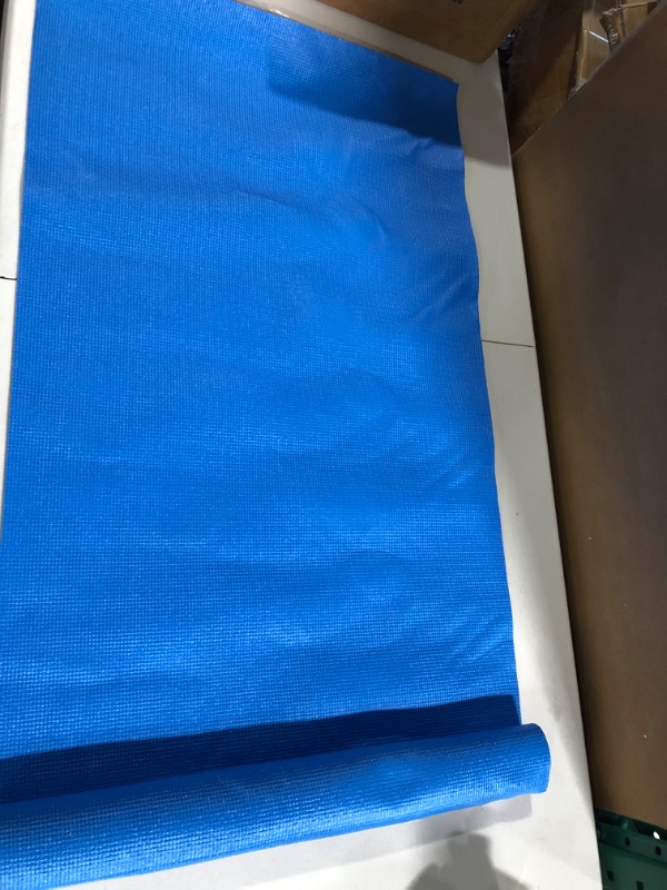 Photo 1 of Blue yoga mat.