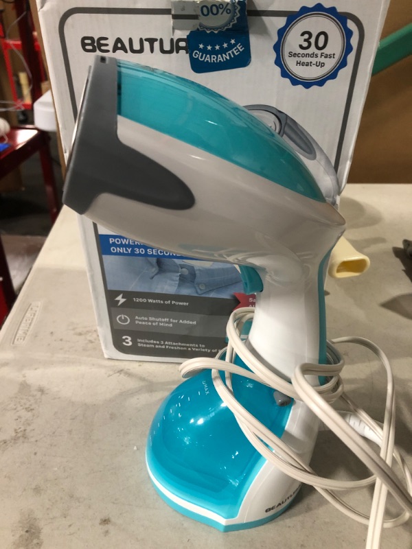 Photo 2 of Beautural handheld garment steamer.