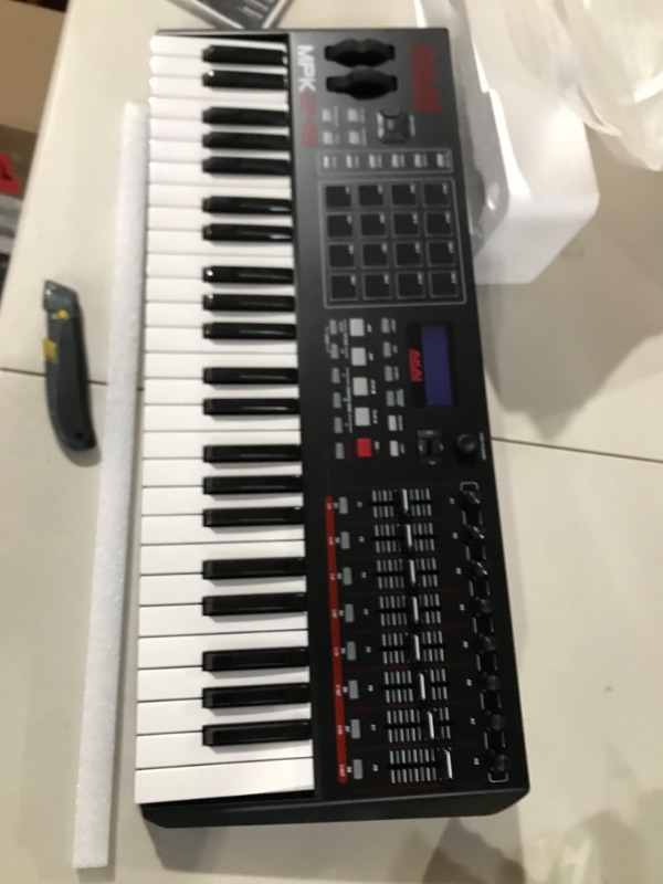 Photo 2 of AKAI Professional MPK261 - USB MIDI Keyboard Controller with 61 Semi Weighted Keys, Assignable MPC Controls, 16 Pads and Q-Links, Plug and Play 61 Keys Controller Only