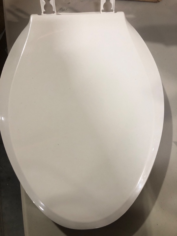 Photo 1 of 
American Standard Elongated Closed-Front Toilet Seat with Soft Close, Grip Tight, and Quick Release