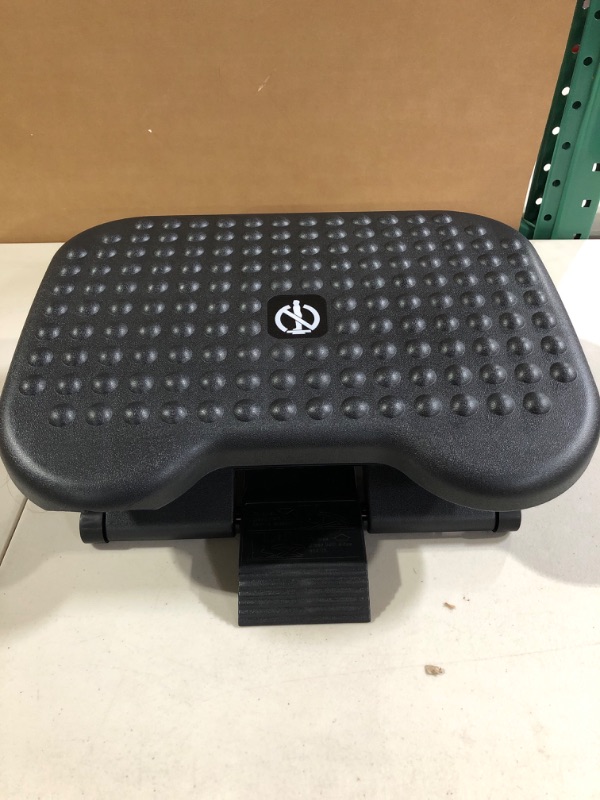 Photo 2 of HUANUO Adjustable Under Desk Footrest, Foot Rest for Under Desk at Work with Massage, Foot Stool Under Desk with 3 Height Position & 30 Degree Tilt Angle Adjustment for Home, Office